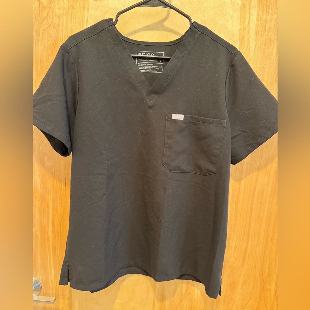Figs Woman’s Black scrub top. Size Large.
